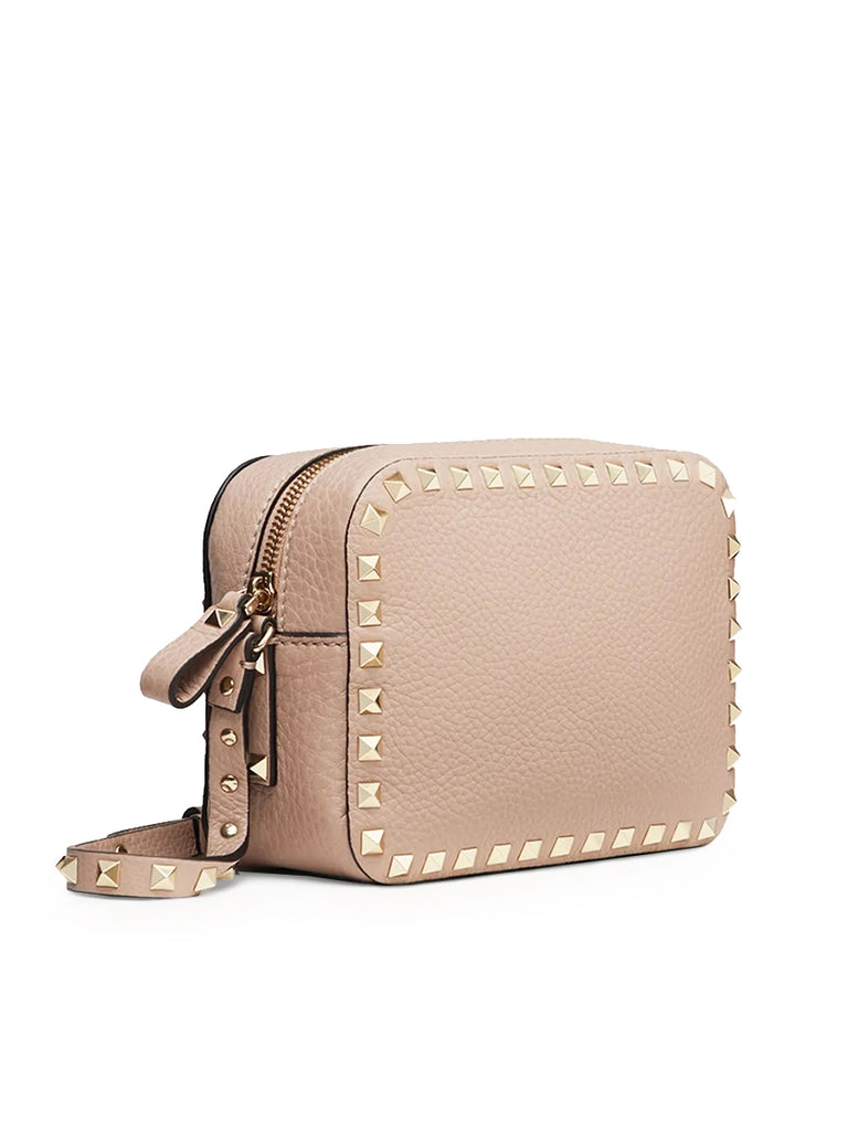 Small rockstud metallic discount grainy leather crossbody bag